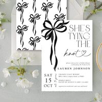 Celebrate the bride-to-be with our exquisitely designed watercolor Black Bow She's Tying the Knot Black Bridal Shower Invitation, featuring a delicate bow and the charming headline "She's Tying the Knot." This invitation is the perfect blend of modern elegance and timeless beauty, setting the tone for a memorable celebration.  Elegant Watercolor Design: The invitation showcases a stunning black watercolor background that adds a touch of sophistication and grace. The gentle wash of black hues cre