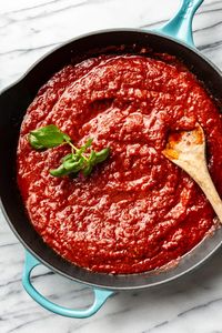 Marinara sauce is the perfect Italian tomato sauce that's delicious over pasta or in a variety of other recipes (like in pasta bakes, in sandwiches, as a dip, etc.). This recipe uses canned tomatoes, olive oil, fresh garlic, basil, and comes together quickly. The whole family will love it. It's much better than store bought, and you can even freeze it.