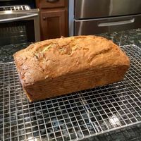 This delicate apple loaf studded with chopped walnuts is simple to make. Enjoy a slice for breakfast or with a cup of afternoon tea.