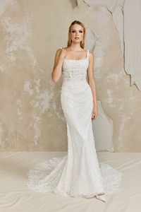 This stunning column wedding dress is adorned with all over 3D petals and dazzling details! Try on Burns by Justin Alexander Signature at Laura and Leigh!