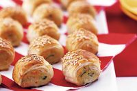 Chicken mince, lots of vegies and fresh herbs make these sausage rolls something special.