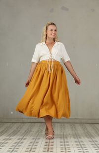 "Party, business, school, where will you want to wear this skirt? Clean,crisp and polished: YELLOW Skirt is a timeless wardrobe staple. This is a plus size version of our Daisy skirt. Be a goddess in our curvy line. For far too long, plus-size dresses have been synonymous with baggy, shapeless, and style-less outfits. But goddess like plus-size dresses do exist. Usually, as the size increases, fashion industry often just use more fabrics. Unfortunately, it is difficult to balance the amount of f