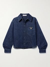 Valentino Garavani's shirt is embellished with a gold-tone 'V' logo that sits neatly on the notched chest pocket. Cut from denim in a dark-blue wash, it has a boxy shape with slightly dropped shoulders and blouson sleeves. Wear yours with tonal jeans and boots.