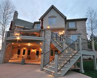 Gallery This Greenwood Village, Colorado project was a complete facelift. The existing deck consisted of boring square lines and rotting floor joists. The small staircase was poorly positioned and the grill resided in a corner against the railing. Our remodel consisted of new composite Moistureshield decking throughout and a new radius curve between pillars. The …