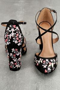 The Lottie Black Embroidered Ankle Strap Heels are the fun, floral heels you have been searching for! Black vegan suede shapes an embroidered almond toe upper, and adjustable crisscrossing ankle strap with silver buckle. Matching embroidered block heel and sturdy heel cup.