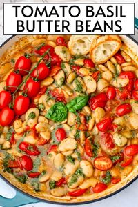 These 10-minute vegan butter beans are cooked in a garlicky tomato pesto sauce and served with crusty bread or pasta. This is the easy butter bean recipe that you have been looking for!  They're dairy-free, soy-free, nut-free, and gluten-free so everyone can enjoy them! thehiddenveggies.com