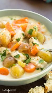 This Slow Cooker Garlic Parmesan Chicken Stew is bound to be your new favorite winter comfort food! It's hearty, creamy, cheesy and loaded with vegetables! The crockpot makes it an easy weeknight meal.