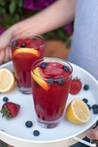 Fresh berry puree is combined with homemade simple syrup and fresh lemon juice. This tart-sweet beverage is just the thing for your summer gatherings! ~ http://www.fromvalerieskitchen.com