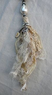 love how the fabric is wire wrapped with pendants and pearls