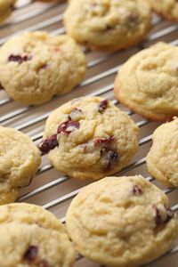 Cranberry Orange Meltaway Cookies are soft, tart and sweet! The texture is fantastic and the fresh orange zest and glaze makes these cookies irresistible!