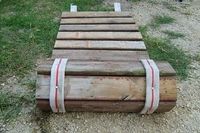 Roll-up sidewalk made from pallet wood and old fire hose. Good for the camper could make it wider - Outdoor Ideas