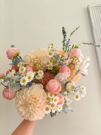 ❤The bouquet with colorful (light blue, pastel pink, white, peach) faux flowers in many types, some of which are real touch flowers.  They are perfect for spring or summer weddings~~  ❤Matching bouquets, boutonnieres... All matching items are available, please message us for a quote, we would love to work with your budget and do custom wedding packages just for you  ❤Change flower colors If you love this bouquet but want different colors, please send me a message, and we'd be happy to provide a