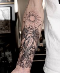 32 Meaningful Angel Tattoos for Men in 2024