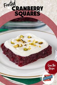 Get ready to wow your guests this Thanksgiving with a unique dessert that's as festive as it is delicious - our Frosted Cranberry Squares recipe! This delightful treat combines the tangy zest of cranberries and the sweet burst of raspberry-flavored gelatin. Add in some crushed pineapple for a tropical twist and top it all off with fluffy whipped cream and crunchy pistachios. It's not just a dessert, it's a holiday celebration in every bite! Whip up this Thanksgiving dessert today!