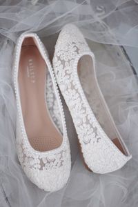 "Delicate lace flats with added mini pearls along topline. Comfortable throughout your special day and perfect for wedding party. DETAILS: COLORS AVAILABLE: White Lace and Ivory Lace UPPER: Synthetic upper and lining MATERIALS: Mandmade outsole STYLE NAME: BABA-53 Not sure of which size to purchase? Shoes measurements are as follow: (Please note measurements taken the length of inside of shoe from toe to heel) Size 5.5: 8.75 inches Size: 6: 9 inches Size 6.5: 9.25 inches Size 7: 9.375 inches Siz