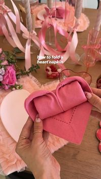 heart napkins! 💕 a cute way to fold napkins for your next galentines get together with the girls! +Fold into a triangle +Bring ends in making an “envelope” +Fold both edges in and flip over +Roll + turn +Bring back edges in +Shape the heart save and share🫶🏻 #galenntine #galentinesparty #tablescape #tablescapeinspo #valentine #pinkaesthetic #bowtrend #diyparty #diy #partydecor #heartnapkin