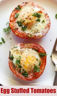 Tasty breakfast tomatoes are stuffed in eggs and baked in the oven until the tomatoes are just tender and the egg whites are fully cooked.