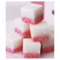 A festive coconut candy with two colors. A chewy and delicious treat.