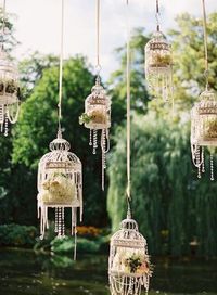 Hanging Birdcage Wedding Decor / http://www.deerpearlflowers.com/hanging-wedding-decor-ideas/2/