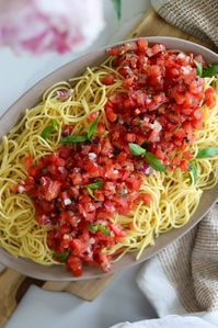 Bruschetta Pasta Salad is the perfect light and fresh summer pasta side dish you must try! Made by combining fresh bruschetta with spaghetti pasta this recipe uses the freshest ingredients, is one of the easiest to make and comes together in no time. Recipe is vegan and vegetarian friendly, and includes a step-by-step recipe video.