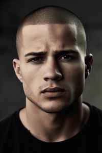 The buzz cut which emphasizes a defined strong jawline is a simple and uncomplicated short hairstyle for men. This style’s simplicity accentuates the angles of the face making it an excellent choice for men with angular features. Click here to check out more best short hairstyles and haircuts for men.