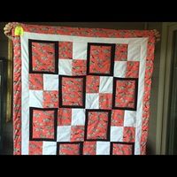 Brand New. Cute Zebra Print With Black And White Border Accents! That’s What Makes This Handmade Quilt So Adorable. The Background Color Is Coral Behind The Zebras. Measuring 40” X 54 1/2”, This Quilt Was Handmade From All New 100% Cotton Fabrics In A Smoke Free Home. The Back Side Is A Small Black And White Check. Wouldn’t This Make A Great Gift! Buy Now And Save It For The Holidays! Quilted With Love.