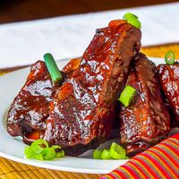 Maple Chipotle Barbecue Braised Ribs. A fall-apart, tender ribs in a sweet and smoky barbecue sauce that slow cooks right in your oven.