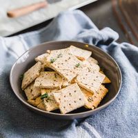 Use up leftover almond pulp from making almond milk and make these easy vegan almond pulp crackers flavored with simple herbs and spices.