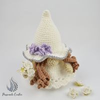 How to crochet your own wedding gnome- free pattern https://www.passionatecrafter.com/how-to-crochet-your-own-wedding-gnome-free-pattern/