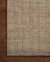 Hand-woven of jute and wool, the Cornwall Mocha / Natural Rug has a natural, organic look with a clean and classic striped design. This area rug collection is an elegant neutral that styles easily in a range of living rooms, bedrooms, dining rooms, and even mudrooms. Soft, earth-toned colors complement the rug’s natural materials and aesthetic. Made of jute and wool in India and GoodWeave certified, ensuring our commitment to ethical production and the support of weavers’ communities. Designed b