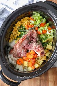 This Ham Bone Soup recipe is such a great mix of leftover ham, beans, and other amazing additions like fresh vegetables. It is the perfect way to use up any holiday ham! Just toss all the ingredients into the slow cooker and let it simmer away. Seve this easy soup recipe with your favorite buns or biscuits for a meal everyone will love. #spendwithpennies #hambonesoup #slowcooker #leftoverham