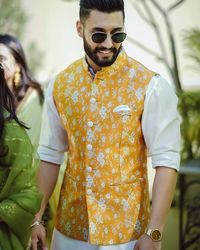 Haldi Outfit For Bride ,Groom, Groomsmen And Bridesmaid. Jacket 1 Digital Print In Yellow & Off White Fabric -Silk Jacket 2 Printed Jacket In Yellow Silk Jacket 3 Yellow Silk Nehru Jacket Embroidered In Cream Thread Spread Uniquely. Jacket 4 Mustard Yellow Silk Jacket Embroidered With Authentic Gold Zari Intricate Work. Any Color Customisation Can Be Done