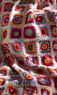 "🌿  Crocheted Granny Square Afghan Throw, Knitted Cotton Geometrical Bohemian Blanket, Rainbow Bedspread, 🌿  Hand Knitted Crochet Granny Square Blanket 🌿  Size: 125 x 100 cm  50x40 inçhes 🌿. You may wash at 30 degrees on \"delicates\" or \"wool\" programs and dry it on a flat surface 🌿. For more products don't forget to check my store: https://www.etsy.com/shop/LILYBAZAAR"