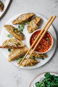 This super easy vegan potsticker recipe goes so well with my sesame chilli dipping sauce. Your whole family will love making and eating them!