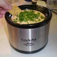 Mexican Dip 2 pounds of ground meat 1 brick of velvetta cheese 1 can of refried beans 1 large jar of taco sauce brown the meat, cooked through. Add the meat, cheese, beans and taco sauce to the crock pot. Let everything melt together and then serve with chips... football season!