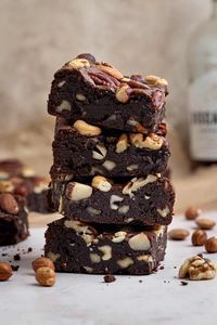 Nutty rum brownies – gooey, fudgy, seriously chocolatey vegan brownies with a boozy kick and plenty of crunchy nuts.

They have a beautiful shiny, crisp crust and are made using simple, everyday ingredients and no egg replacers.