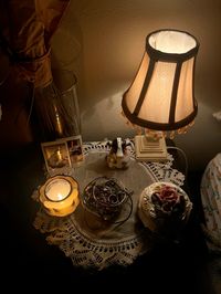 Nightstand, trinkets, vintage lamp fall time