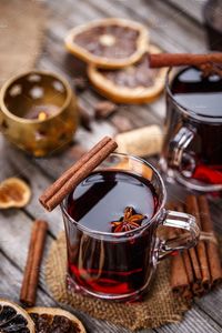 Christmas mulled wine featuring wine, hot, and cinnamon | High-Quality Food Images ~ Creative Market