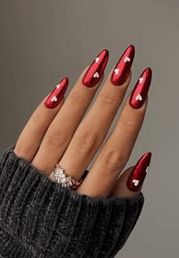 Discover the timeless allure of red nails with these 50+ classy designs that exude passion, power, and sophistication. From true red to matte, dark, and French tips, these manicures are a fashion statement that will never go out of style. Elevate your look and express your unique style with these glamorous and fun red nail designs. Find inspiration for your next manicure today!