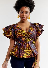 Sankofa, Ghanaian for retrieve, and the name of a mythical bird that represents springtime. With the double later ruffle sleeves and peplum waist, making the 100% cotton light as a feather. The Sunset Adire colorway is sultry, great for the office with a pencil skirt and for being seen out and about in jeans and heels.