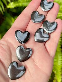 Only $3.99 each! Infuse your space with protective loving energy with these Hematite Hearts! Hematite absorbs negative energy and provides the wearer with a sense of calm in times of stress or worry. This is a highly protective stone and is great to carry with you to help you stay grounded. It can help one to find their own, unique gifts and to release self-imposed limitations, while maintaining a sense of self-control. Hematite is also thought to strengthen self-confidence. #crystals #crystalhealing #crystalmagic #crystaljewelry #crystallovers #crystalhearts #hematite #hematitehearts   Get yours now before they’re gone: https://morgannastreasures.com/collections/metaphysical-gifts/products/small-hematite-heart-palm-stones