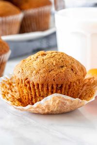 These moist and flavorful carrot muffins have a delicious carrot cake flavor with a hint of cinnamon. They're tender in the middle with perfect muffin tops! #carrot #carrotcake #muffins #easy #moist #cinnamon #brownsugar #breakfast #brunch from Just So Tasty