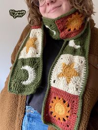 Crochet sun, moon, and star granny square scarf! This long celestial granny square scarf is completely handmade by me! Granny Square Patterns by AlyssiaCreates . All yarn used is soft acrylic in the colors pumpkin, mustard, ginger, off-white, and leaf green. The finished scarf is about 68" x 5.5" WHAT TO EXPECT - One celestial sun, moon, and star granny square scarf! - Protective packaging so the scarf doesn't get damaged during shipping. - Shipping through USPS! SHIPPING All items are handmade to order and shipped out by me, therefore it can take me 5-7 days to get an item in the mail. Once shipped all items should arrive approximately within 2 weeks, all dependent on the USPS Mailing system. DISCLAIMERS AND NOTES -All items are handmade by me at home. -The granny square patterns are by A