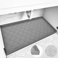 GRAY COLOR under sink mat for home kitchen appliances Link in bio ☝️☝️🇺🇸🇺🇸🇺🇸🇺🇸🇺🇸 waterproof under the sink mat is designed with dimensions of 34” x 22”【Before making a purchase, kindly measure your kitchen sink cabinet base to ensure it is equal to or larger than our undersink mat. This mat is ideal for cabinets where pipes run along the back wall rather than the bottom. It effectively safeguards wooden cabinets from moisture and mold damage caused by pipe leaks or spills from cleaning suppl...