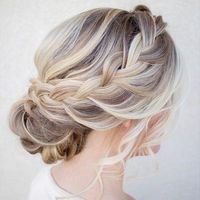 Side French braid into a Low Bun