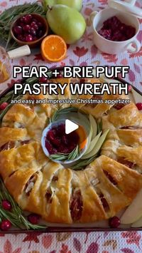 Evite on Instagram: "Since you all liked our last Friendsgiving recipe so much… this cheesy, fruity, golden brown dough-y wreath comes together in minutes and looks *so* impressive (even to that one friend that’s a little judgmental… gotta love ‘em…). 🎄🧀🍐

Recipe c/o @sarahtreed (find it on her blog!)."