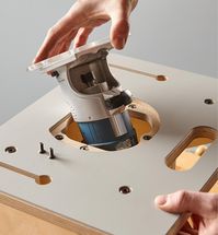 If you own a compact router, you already know what a useful tool it is. Specifically designed for use with compact routers, this table is the ideal complement; it lets you make the most of the tool’s small size and maneuverability for freehand use and adds the stability, safety and control of a router table that is compact, portable and easy to store. The table and fence combination brings repeatable accuracy to a wide range of common routing operations. The sturdy 15 1/2" × 11 1/2" table top is