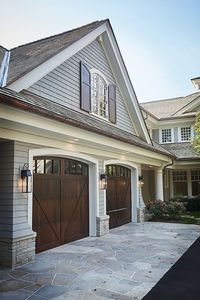 Shingle home with wood garage doors and bonus room above garage. #Shinglehomegarage #woodgaragedoors #bonusroomabovegarage