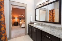 Large bathrooms with granite or quartz countertops