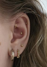 conch piercing, helix piercing, rook piercing, third lobe, second lobe, first lobe